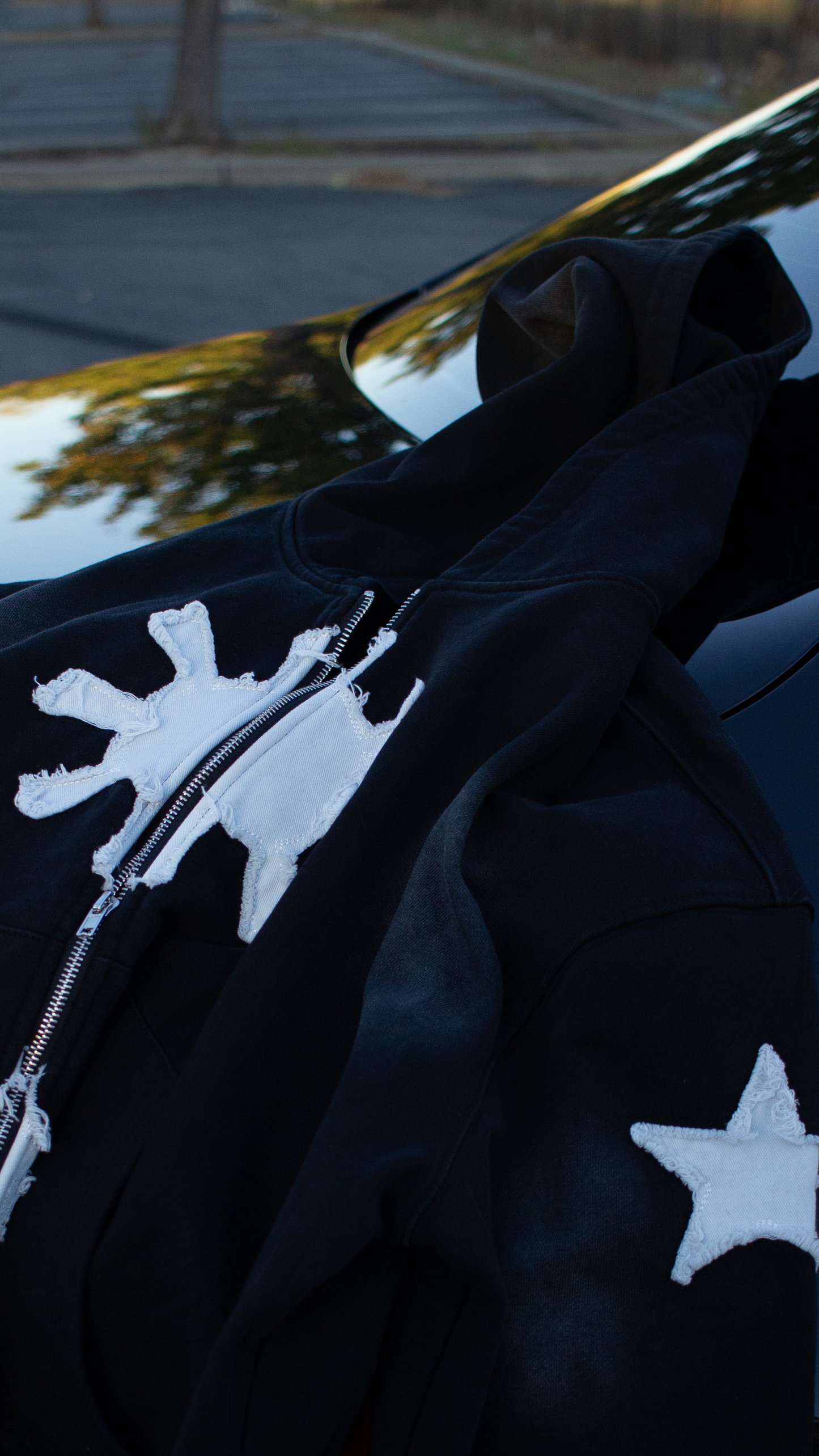 BLACK THREE STARS AND A SUN ZIP UP